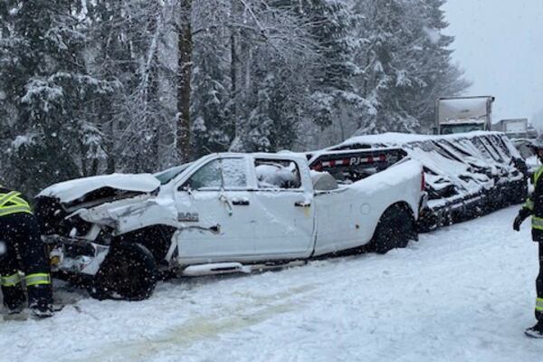 This photo provided by the Washington State Department of Transportation shows vehicles piled up on a snowy Interstate 5 highway in Southwestern Wash., Thursday, Feb. 13, 2025. (Washington State Department of Transportation via AP)