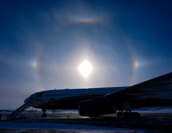 A sundog is pictured over the Canadian Prime Minister's plane in Iqaluit, Nunavut, Tuesday, March 18, 2025. (Sean Kilpatrick/The Canadian Press via AP)