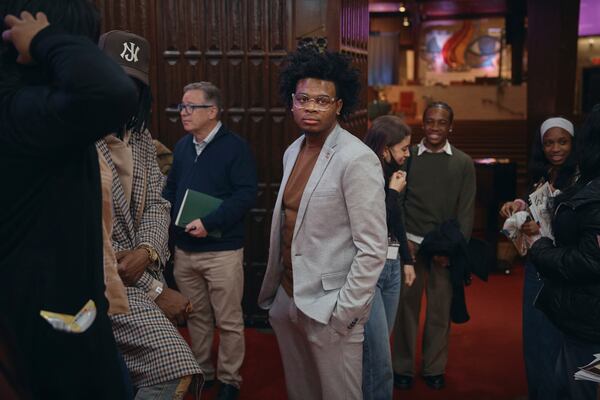 Young Voters Association President, Nathan Duguid, 19, center, stands during a Town Hall and voter registration for school board elections at the Bethany Baptist Church, Saturday, Feb. 1, 2025, in Newark, N.J. (AP Photo/Andres Kudacki)