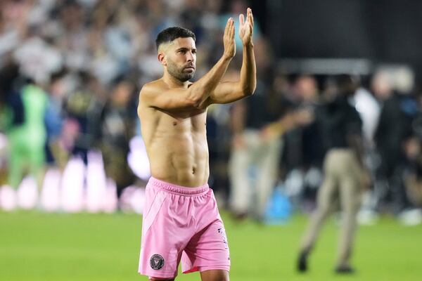 Inter Miami defender Jordi Alba applauds to fans after a CONCACAF Champions Cup second-leg semifinal soccer match against the Vancouver Whitecaps, Wednesday, April 30, 2025, in Fort Lauderdale, Fla. (AP Photo/Lynne Sladky)