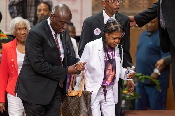 FILE - Attorney Ben Crump, left, helps Donna Massey, mother of Sonya Massey, towards the podium during a press conference over the shooting death of Sonya, who was killed by Illinois sheriff's deputy Sean Grayson, at New Mount Pilgrim Church in the Garfield Park neighborhood in Chicago, Tuesday, July 30, 2024. (Tyler Pasciak LaRiviere/Chicago Sun-Times via AP, File)