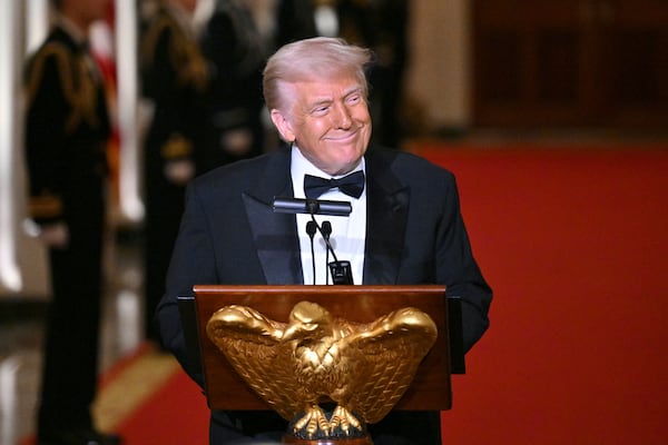 President Donald Trump addresses the National Governors Association dinner and reception in the East Room of the White House Saturday, Feb. 22, 2025, in Washington. (Pool via AP)