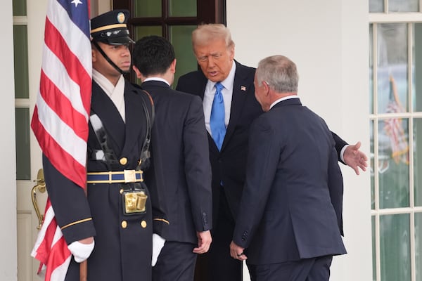 President Donald Trump greets Jordan's King Abdullah II at the White House, Tuesday, Feb. 11, 2025, in Washington. (AP Photo/Evan Vucci)