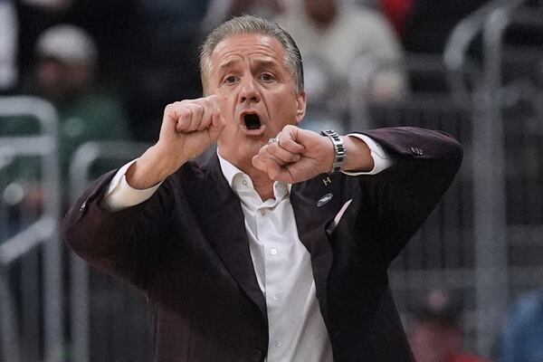 Arkansas head coach John Calipari calls to his players during the first half in the first round of the NCAA college basketball tournament, Thursday, March 20, 2025, in Providence, R.I. (AP Photo/Charles Krupa)