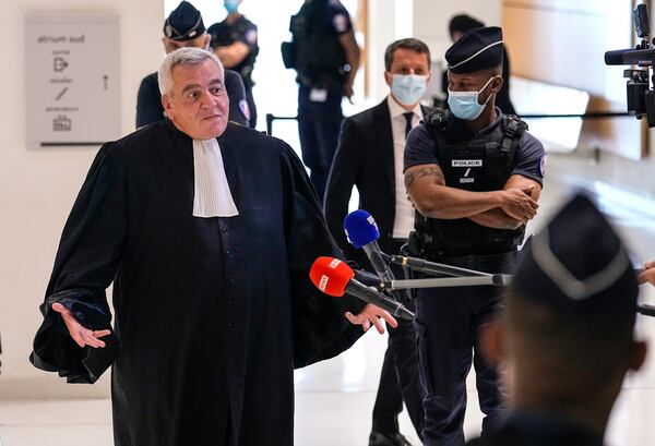 FILE - Thierry Herzog, lawyer of former French President Nicolas Sarkozy, speaks to the media after the verdict was announcement at Paris' courthouse, Thursday, Sept. 30, 2021. (AP Photo/Michel Euler, File)