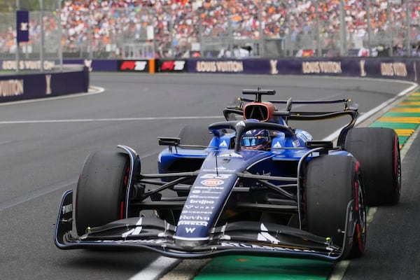 Williams driver Alexander Albon of Thailand steers his car during qualifying at the Australian Formula One Grand Prix at Albert Park, in Melbourne, Australia, Saturday, March 15, 2025. (AP Photo/Scott Barbour)