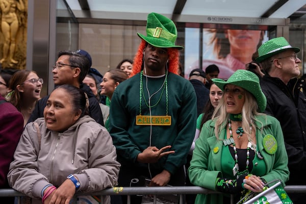 Crowds watch the 264th New York City Saint Patrick's Day Parade, Monday, March 17, 2025 in New York. (AP Photo/Adam Gray)