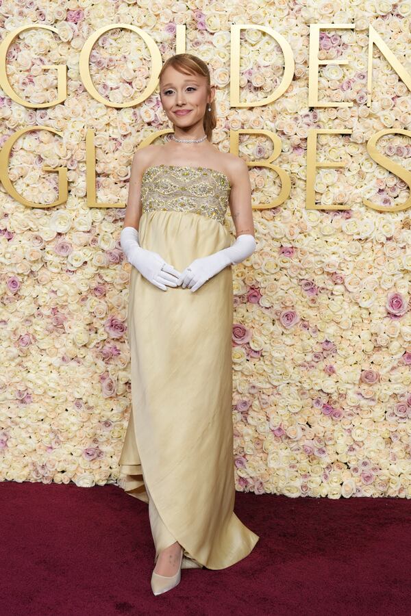 Ariana Grande arrives at the 82nd Golden Globes on Sunday, Jan. 5, 2025, at the Beverly Hilton in Beverly Hills, Calif. (Photo by Jordan Strauss/Invision/AP)