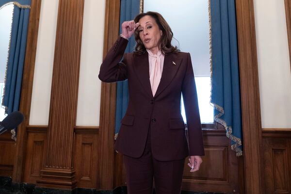 FILE - Vice President Kamala Harris talks to reporters after overseeing the ceremonial certification of her defeat to incoming President-elect Donald Trump, at the U.S. Capitol in Washington, Jan. 6, 2025. (AP Photo/Jose Luis Magana, File)