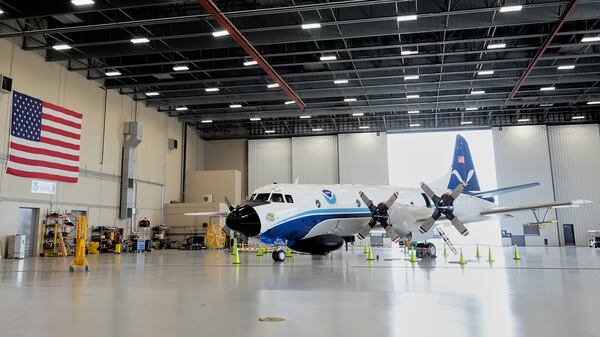 The Lockheed WP-3D Orion "Hurricane Hunter" aircraft is seen in a hangar at the NOAA Aircraft Operations Center Tuesday, May 6, 2025, in Lakeland, Fla. (AP Photo/John Raoux)