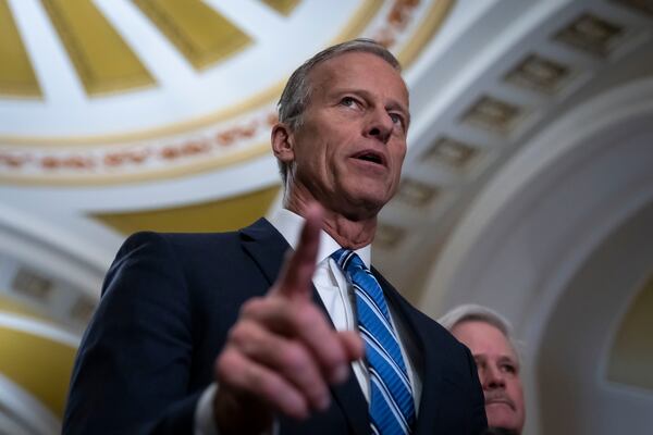 Senate Majority Leader Sen. John Thune, R-S.D., speaks to reporters after a Senate policy luncheon, at the Capitol in Washington, Tuesday, Feb. 25, 2025. (AP Photo/Ben Curtis)