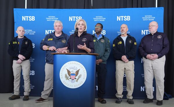 National Transportation Safety Board Chair Jennifer Homendy speaks during a press conference at Ronald Reagan Washington National Airport, Thursday, Jan. 30, 2025, in Arlington, Va., as board members look on. (AP Photo/Stephanie Scarbrough)