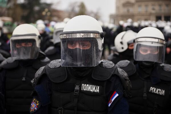 Anti-riot police cordons off the area near the Parliament building during a major rally against populist President Aleksandar Vucic and his government, in downtown Belgrade, Serbia, Saturday, March 15, 2025. (AP Photo/Armin Durgut)