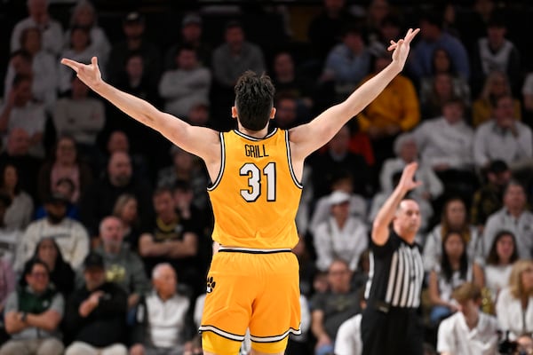 Missouri guard Caleb Grill (31) reacts after sinking a 3-point basket against Vanderbilt during the first half of an NCAA college basketball game Saturday, March 1, 2025, in Nashville, Tenn. (AP Photo/John Amis)