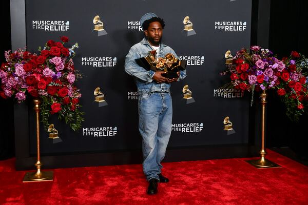 Kendrick Lamar poses in the press room with the award for record of the year, best rap performance, best rap song, best music video and song of the year during the 67th annual Grammy Awards on Sunday, Feb. 2, 2025, in Los Angeles. (Photo by Richard Shotwell/Invision/AP)