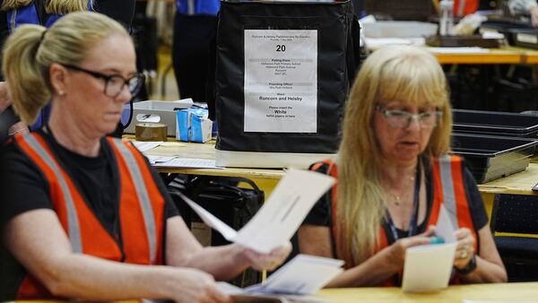 Votes are counted at DCBL Halton Stadium, in Widnes, Cheshire, England, for the Runcorn and Helsby by-election that was triggered by the resignation of former Labour MP Mike Amesbury, Thursday May 1, 2025. (Peter Byrne/PA via AP)