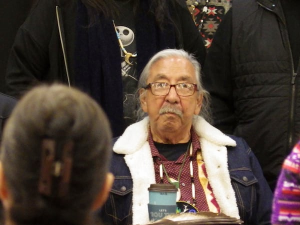 Leonard Peltier, a Native American activist released from a Florida prison where he had been serving a life sentence in the 1975 killings of two FBI agents, watches the crowd during a welcome event, Wednesday, Feb. 19, 2025, at the Sky Dancer Casino Resort near Belcourt, N.D., on the Turtle Mountain Reservation. (AP Photo/Jack Dura)