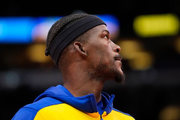 Golden State Warriors forward Jimmy Butler warms up before an NBA basketball game against the Chicago Bulls, Saturday, Feb. 8, 2025, in Chicago. (AP Photo/Erin Hooley)