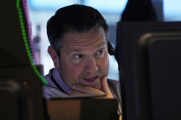 Trader Leon Montana works on the floor of the New York Stock Exchange, Thursday, May 1, 2025. (AP Photo/Richard Drew)