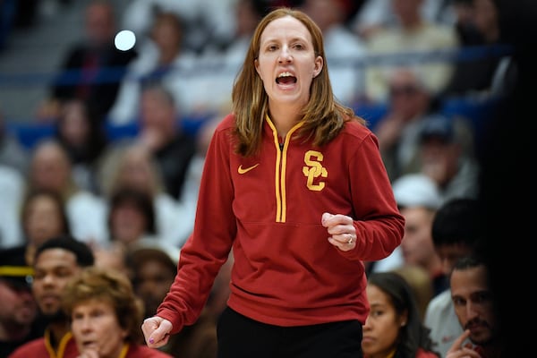 Southern California head coach Lindsay Gottlieb calls to her team in the first half of an NCAA college basketball game against UConn, Saturday, Dec. 21, 2024, in Hartford, Conn. (AP Photo/Jessica Hill)