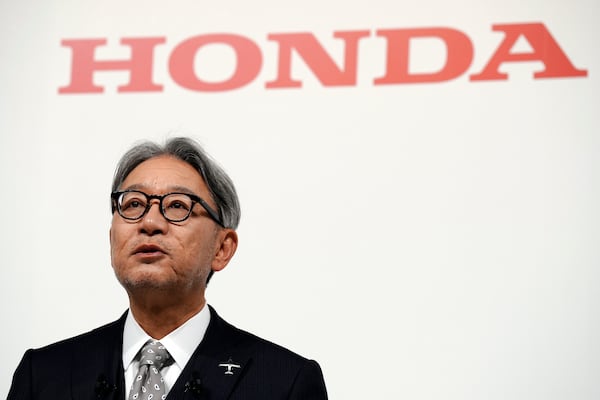 FILE - Honda Chief Executive Toshihiro Mibe speaks during a joint news conference with Nissan and Mitsubishi representatives in Tokyo, Japan, Monday, Dec. 23, 2024. (AP Photo/Eugene Hoshiko, File)