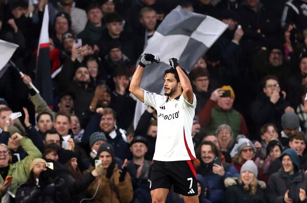 Fulham's Raul Jimenez celebrates scoring the opening goal during the English Premier League soccer match between FC Fulham and AFC Bournemouth, in London, Sunday, Dec. 29, 2024. (Steven Paston/PA via AP)