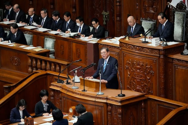 Japan's Prime Minister Shigeru Ishiba delivers a policy speech marking the start of the year's parliamentary session in Tokyo, Friday, Jan. 24, 2025. (AP Photo/Eugene Hoshiko)