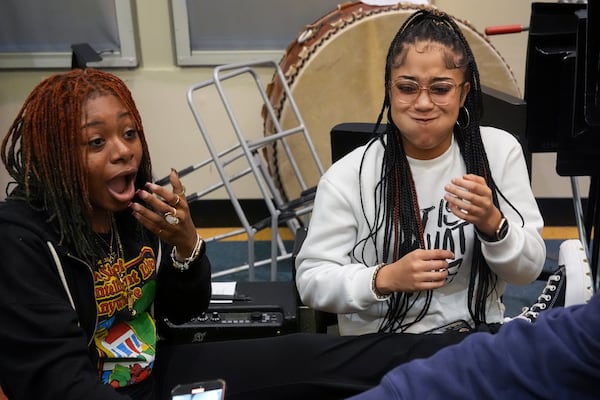 Pasley Thompson, left, and Tatiyana Clark, joke around before rehearsal at Stax Music Academy, Thursday, Jan. 30, 2025, in Memphis, Tenn. (AP Photo/George Walker IV)