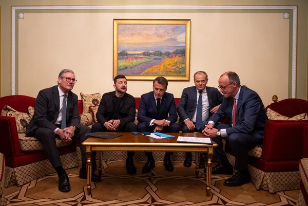 From left, British Prime Minister Keir Starmer, President Volodymyr Zelenskyy, French President Emmanuel Macron, Polish Prime Minister Donald Tusk and German Chancellor Friedrich Merz make a call to U.S. President Donald Trump from Kyiv, Ukraine, on Saturday, May 10, 2025. (AP Photo/Mstyslav Chernov)