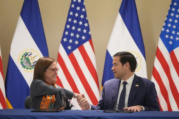 U.S. Secretary of State Marco Rubio, right, and El Salvador's Foreign Minister Alexandra Hill Tinoco shake hands after signing a memorandum of understanding regarding civil nuclear cooperation between their countries at the Intercontinental Real Hotel in San Salvador, El Salvador, Monday, Feb. 3, 2025. (AP Photo/Mark Schiefelbein, Pool)