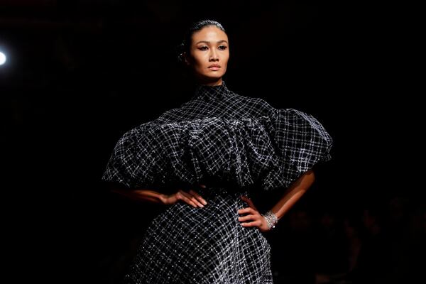 A model walks the runway during the Christian Siriano Fall/Winter 2025 fashion show at Chelsea Industrial during New York Fashion Week on Thursday, Feb. 6, 2025, in New York. (Photo by Charles Sykes/Invision/AP)