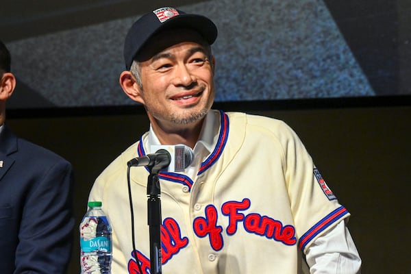 Newly elected Baseball Hall of Fame inductee Ichiro Suzuki talks to reporters during a news conference Thursday, Jan. 23, 2025, in Cooperstown, N.Y. (AP Photo/Hans Pennink)