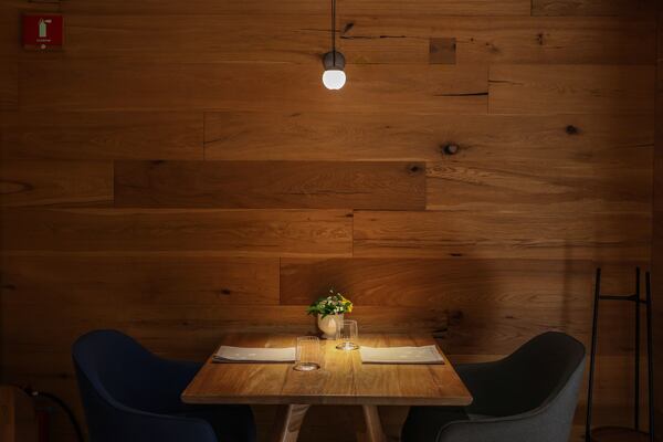 A table sits ready for customers at the Quintonil restaurant in Mexico City, Friday, Feb. 28, 2025. (AP Photo/Ginnette Riquelme)