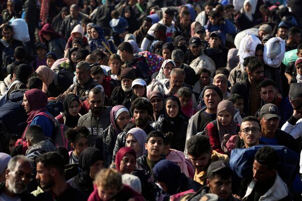 Displaced Palestinians return to their homes in the northern Gaza Strip, following Israel's decision to allow thousands of them to go back for the first time since the early weeks of the 15-month war with Hamas, Monday, Jan. 27, 2025. (AP Photo/Abdel Kareem Hana)