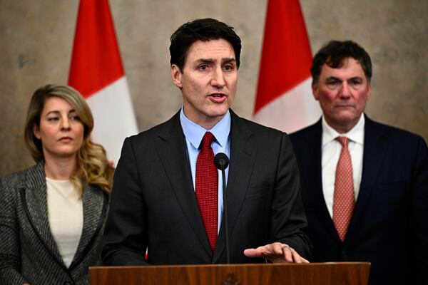 Canadian Prime Minister Justin Trudeau addresses media members after U.S. President Donald Trump signed an order to impose stiff tariffs on imports from Mexico, Canada and China, in Ottawa, Canada, Saturday, Feb. 1, 2025. (Justin Tang/The Canadian Press via AP)