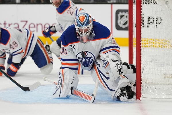 Edmonton Oilers goaltender Calvin Pickard (30) makes a save against the Vegas Golden Knights during the second period of Game 2 of a second-round NHL hockey playoff series Thursday, May 8, 2025, in Las Vegas. (AP Photo/John Locher)