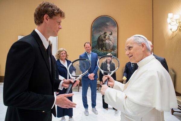 Italy's Jannik Sinner, left, shares a light moment with Pope Leo XIV on the occasion of their meeting at the Vatican, Wednesday, May 14, 2025. (Vatican Media via AP)