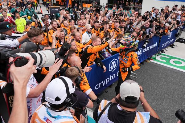 McLaren driver Oscar Piastri of Australia celebrates after winning the Formula One Miami Grand Prix auto race Sunday, May 4, 2025, in Miami Gardens. Fla. (AP Photo/Rebecca Blackwell)