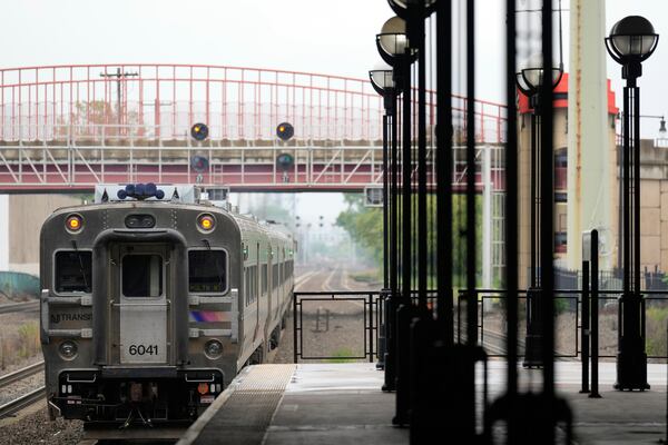 An NJ Transit train leaves the Secaucus Junction station in Secaucus, N.J., Wednesday, May 14, 2025. (AP Photo/Seth Wenig)