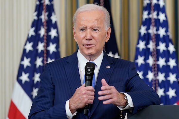 FILE - President Joe Biden answers questions from reporters as he speaks in the State Dining Room of the White House in Washington, Nov. 9, 2022. (AP Photo/Susan Walsh, File)