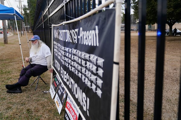 Ron Kaz protests prior to the scheduled execution of Marion Bowman Jr. outside of a South Carolina Department of Corrections facility, Friday, Jan. 31, 2025, in Columbia, S.C. (AP Photo/Erik Verduzco)