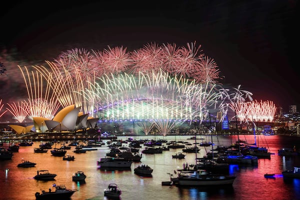 Fireworks explode over the Sydney Opera House and Harbour Bridge during New Year's Eve celebrations in Sydney, Tuesday, Dec. 31, 2024. (Bianca De Marchi/AAP Image via AP)