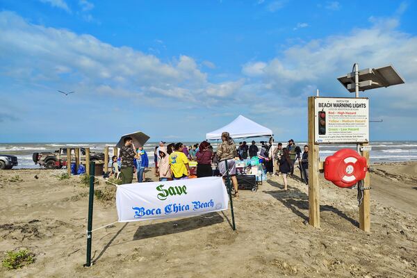People protest at Boca Chica beach, Texas, on Saturday afternoon, May 3, 2025, before an incorporation election that would turn Starbase into an official Texas city. (Miguel Roberts/The Brownsville Herald via AP)