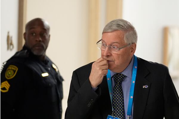 Buffalo Bills owner Terry Pegula walks in a hallway at the NFL football owners meeting Wednesday, Dec. 11, 2024, in Irving, Texas. (AP Photo/LM Otero)