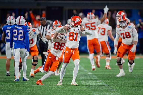 FILE - Clemson place kicker Nolan Hauser (81) reacts after kicking the game winning field goal in the Atlantic Coast Conference championship NCAA college football game against SMU Saturday, Dec. 7, 2024, in Charlotte, N.C. (AP Photo/Jacob Kupferman, FIle)