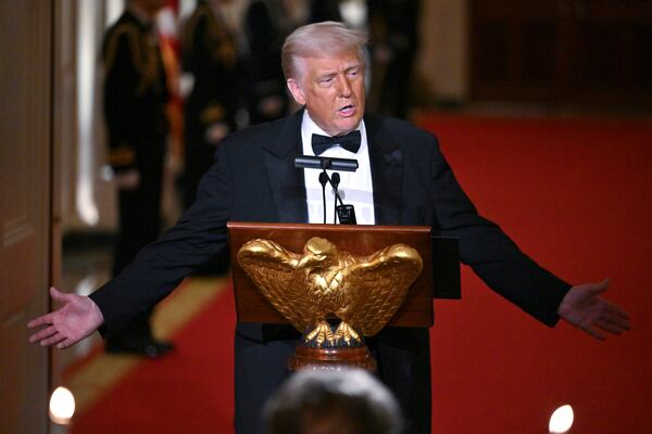 President Donald Trump addresses the National Governors Association dinner and reception in the East Room of the White House Saturday, Feb. 22, 2025, in Washington. (Pool via AP)