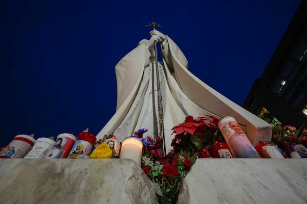 A statue of Pope John Paul II is seen in front of the Agostino Gemelli Polyclinic, Rome, Wednesday, Feb. 19, 2025, where the Pontiff is hospitalized since Friday, Feb. 14. (AP Photo/Andrew Medichini)