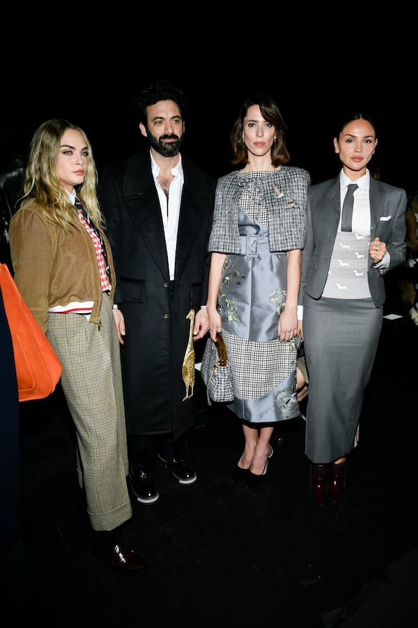 Cara Delevingne, from left, Morgan Spector, Rebecca Hall, and Eiza Gonzalez attend the Thom Browne Fall/Winter 2025 fashion show as part of New York Fashion Week on Tuesday, Feb. 11, 2025, at The Shed in New York. (Photo by Evan Agostini/Invision/AP)