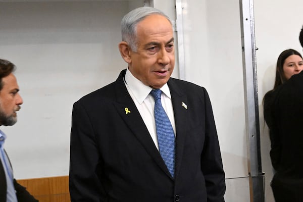 Israeli Prime Minister Benjamin Netanyahu attends the fifth day of testimony in his trial on corruption charges at the district court in Tel Aviv, Israel, on Monday, Dec. 23, 2024. (Debbie Hill/Pool Photo via AP)