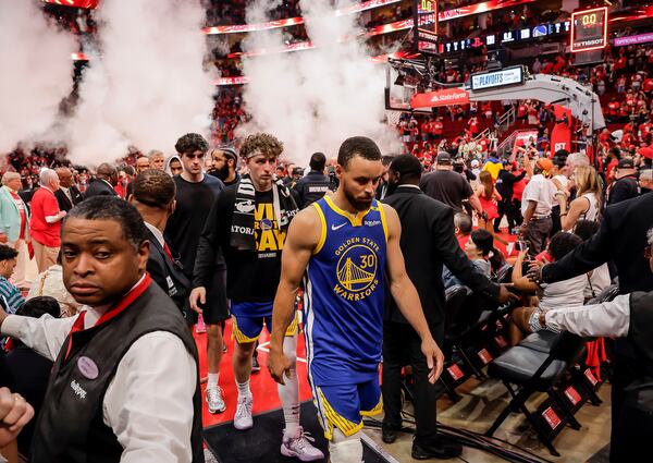 Stephen Curry (30) walks off the court after the Golden State Warriors lost to the Houston Rockets in Game 5 of the First Round of the NBA Playoffs at Toyota Center in Houston, Texas on Wednesday, April 30, 2025. (Carlos Avila Gonzalez/San Francisco Chronicle via AP)